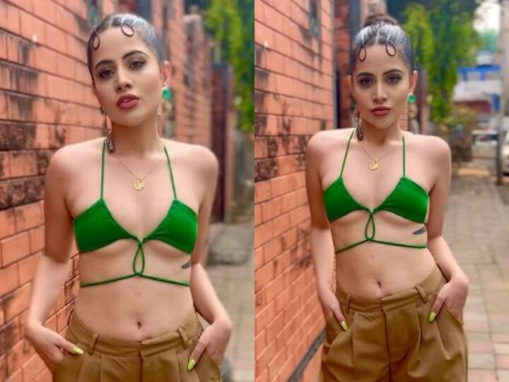 Urfi Javed eats vada pao on road side in designer green crop top flaunts her new outfit स्टाइल से ज्यादा अखबार में बंद ये चीज है उर्फी जावेद की फेवरेट ! सड़क किनारे खड़े होकर उठाती दिखीं लुत्फ
