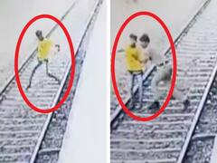 వీడియో: రైల్వే ట్రాక్‌పై యువకుడు, దూసుకొచ్చిన రైలు - రెప్పపాటులో దేవుడిలా వచ్చిన పోలీస్!