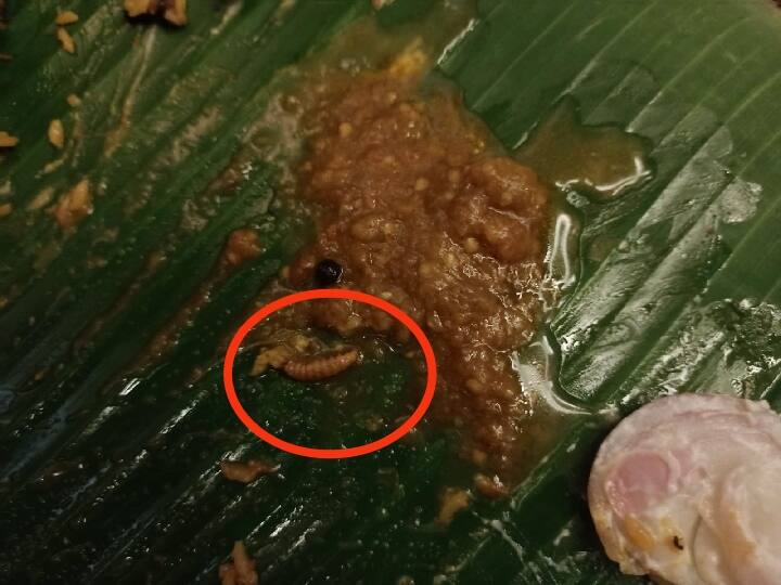 Worm infestation in Talsa for biryani at Salem popular restaurant. சேலம்: பிரபல உணவகத்தில் பிரியாணிக்கு வைக்கப்பட்ட தால்சாவில் புழு:  வாடிக்கையாளர்கள் வாக்குவாதம்