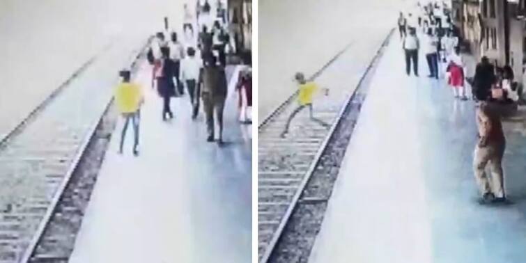 A police personnel saved a teenage boy by pushing him away from the railway track in Thane Viral Video: কয়েক সেকেন্ডে বাজিমাত! রেললাইনে ঝাঁপিয়ে পড়া কিশোরকে ধাক্কা দিয়ে উদ্ধার পুলিশের