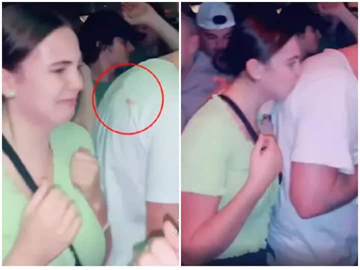 a girl kissing on the back of an unknown person went viral अंजान शख्स की पीठ पर लड़की ने किया किस, फिर हुआ कुछ ऐसा