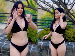 पेड़ से तोड़कर बालों में फूल लगाती दिखीं उर्फी जावेद, ब्लैक बिकिनी पहन ढाया कहर