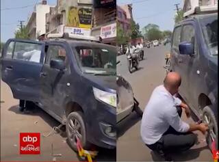 Rajkot : કારચાલકે  ટ્રાફિકના લોકવાળું કારનું ટાયર જ કાઢી નાખ્યું, જુઓ વિડીયો