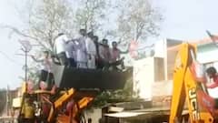 Bulldozer in UP: BJP समर्थकों ने बुलडोजर पर चढ़कर मनाया जश्न, युवक..बच्चे और औरतें Bulldozer पर चढ़े