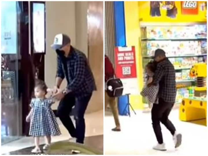 father reached in front of toy shop in shopping complex lifted daughter in her arms with eyes closed  खिलौने की दुकान के सामने पहुंचे पिता की हुई हालत खराब, गजब का आइडिया लगाकर बचा लिए पैसे