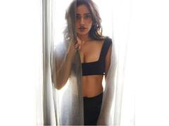 PHOTO : ‘ब्युटी इन ब्लॅक’, नेहा शर्माच्या बोल्ड फोटोशूटने वाढवला इंटरनेटचा पारा!