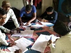 Kaushambi: परीक्षा केन्द्र के बाहर कॉपी लिखते दिखे नकल माफिया, वीडियो वायरल होने पर पुलिस ने लिया ये एक्शन