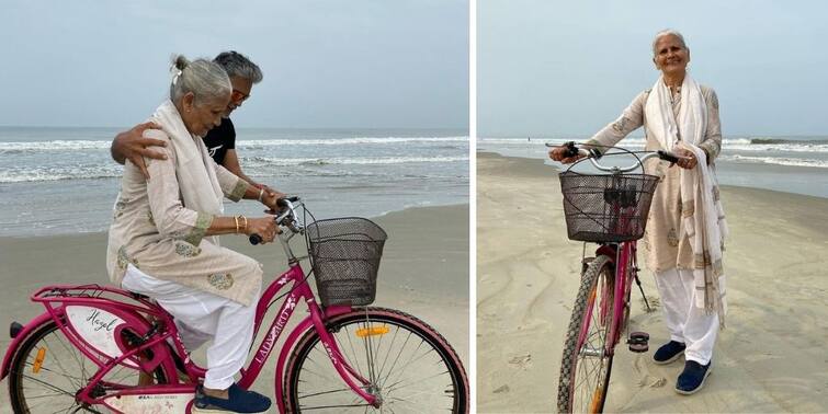 Milind Soman Update: Milind Soman teaches his 83-years-old mother to cycle again Milind Soman Update: ৮৩-তেও ফিট! গোয়ার সৈকতে মাকে ফের সাইকেল চালাতে শেখালেন মিলিন্দ সোমন