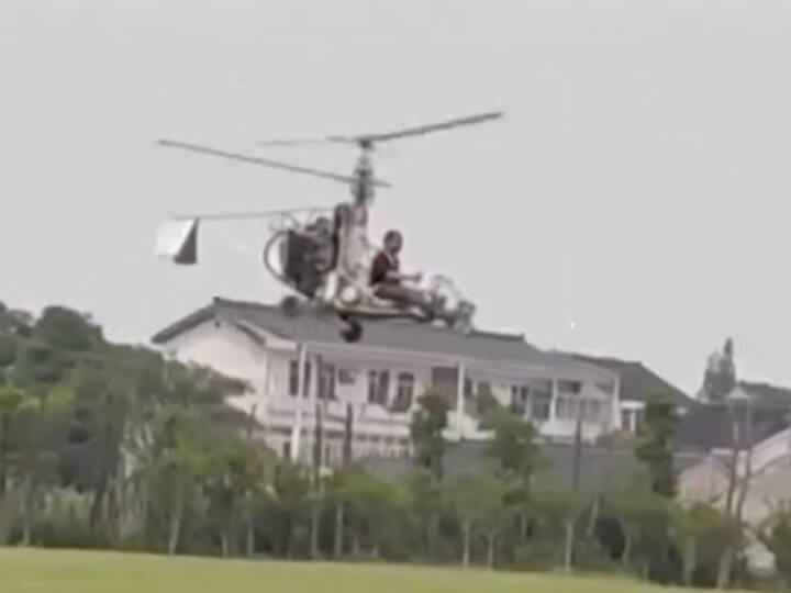 Chinese Man With No Engineering Expertise Stopped From Flying Homemade Helicopter படகு என்ஜினால் வீட்டிலேயே செய்யப்பட்ட ஹெலிகாப்டர்..! அசத்திய நபர் - ஷாக் கொடுத்த போலீசார்!