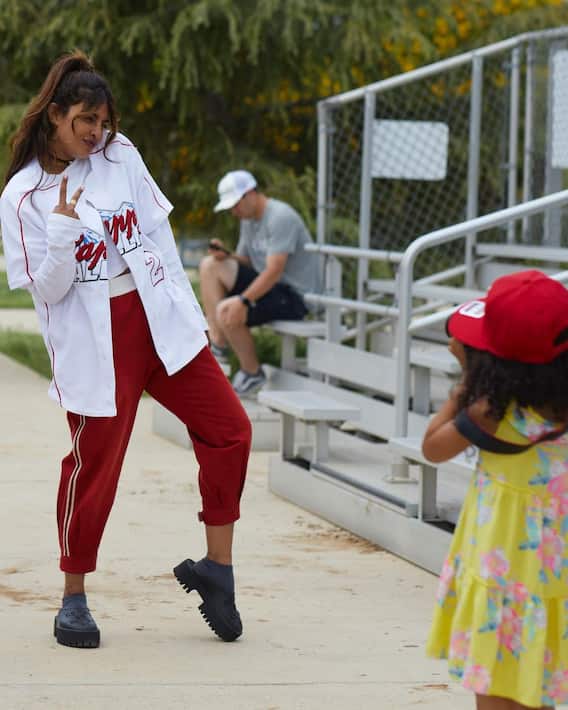 Bollywood: Priyanka Chopra's sporty look in Nick Jonas' baseball match!