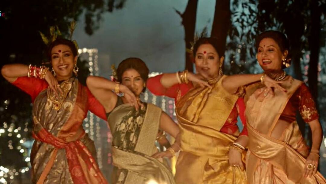 Belashuru: Belashuru second song tapa tini's trailer out know, know in details Belashuru: লোকগীতির জমাটি সুর, 'বেলাশুরু'-র নতুন গানে পা মেলালেন ঋতুপর্ণা, মনামী, অপরাজিতা, ইন্দ্রাণী