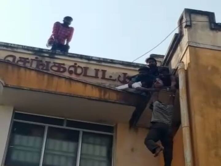 Chengalpattu goverment hospital Suicide attempt jumping from 3rd floor Panic at  hospital செங்கல்பட்டு மருத்துவமனையின் 3-வது மாடியில் இருந்து தற்கொலைக்கு முயன்ற நோயாளி.. காப்பாற்றிய ஊழியர்கள்..