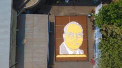 PHOTO : 2 हजार 51 वह्यांनी साकारले 'सिम्बॉल ऑफ नॉलेज', डॉ. बाबासाहेब आंबेडकरांना अनोखी मानवंदना