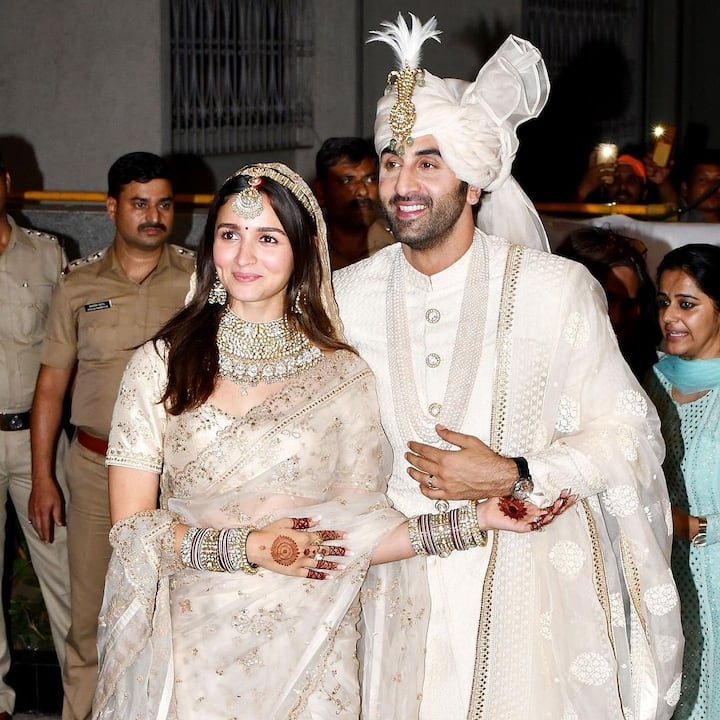 Alia and Ranbir pose for paps after their wedding