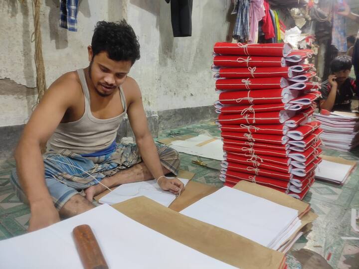 The red rough cotton material used as the cover for these books is called 