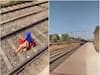 Viral Video : फोनवर बोलत असताना मुलीच्या अंगावरून गेली रेल्वे; पण...पाहा हा थरारक व्हिडीओ