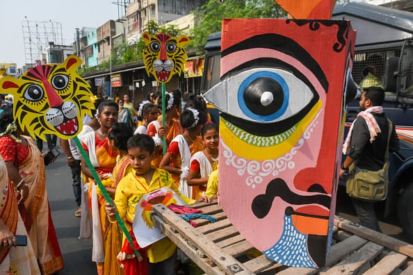 In PICS |  Individuals Rejoice Bengali New Yr 2022 With Colourful Rally In Kolkata & Dhaka