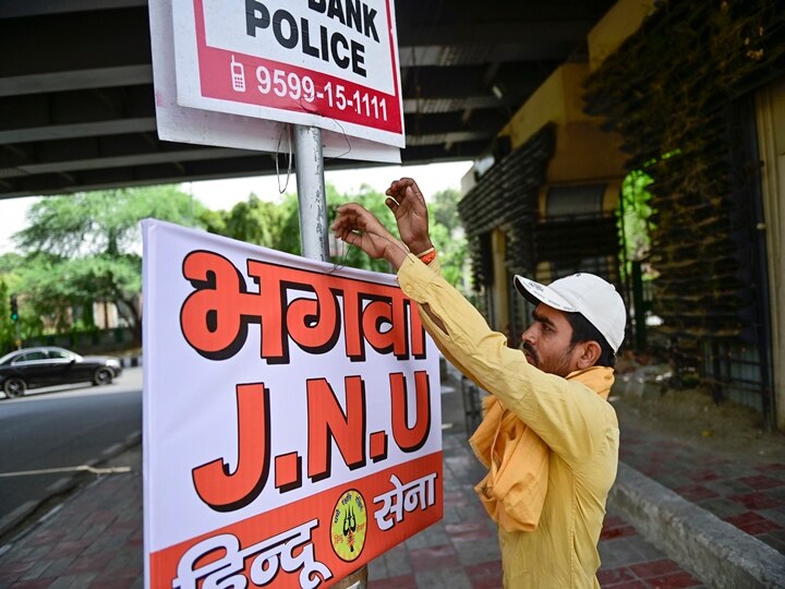 Bhagwa JNU': Hindu Sena Puts Up Saffron Flags & Posters Outside Campus, Warns Students | SEE PICS