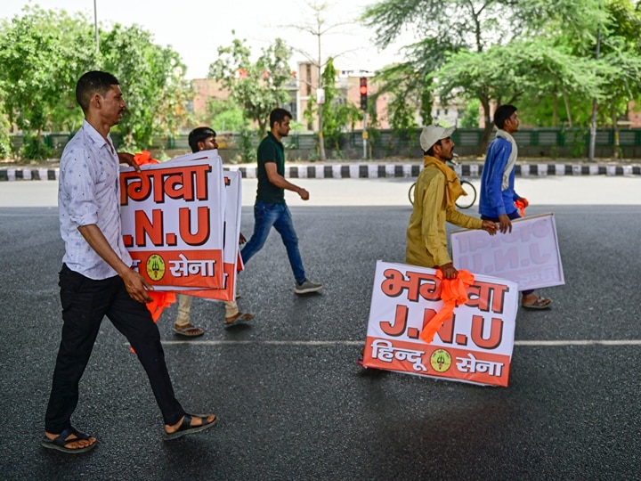 Bhagwa JNU': Hindu Sena Puts Up Saffron Flags & Posters Outside Campus, Warns Students | SEE PICS