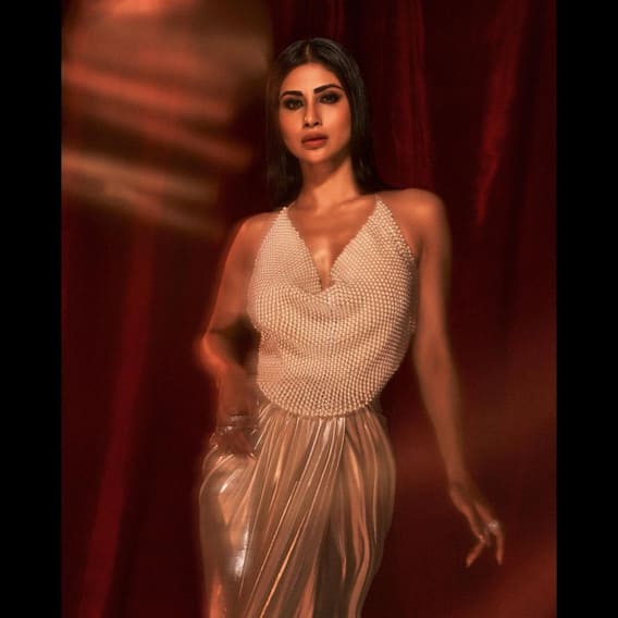 Then came the sizzling look of Mouni Rai, the sensation of wearing a halter neck dress.