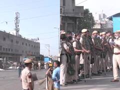 In Pics: जहांगीरपुरी में हिंसा के एक हफ्ते बाद भी इलाके में भारी पुलिस बल तैनात, ड्रोन से रखी जा रही चप्पे-चप्पे पर नजर