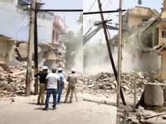 Alwar News: राजस्थान के अलवर में 300 साल पुराने शिव मंदिर पर चला बुलडोजर, स्थानीय लोगों ने जमकर किया बवाल