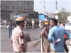 In Pics: जहांगीरपुरी में हिंसा के एक हफ्ते बाद भी इलाके में भारी पुलिस बल तैनात, ड्रोन से रखी जा रही चप्पे-चप्पे पर नजर