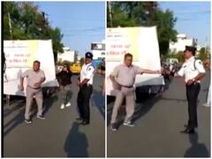 Watch: ट्रैफिक पुलिस के साथ सड़क के बीचो-बीच शख्स ने लगाए ठुमके, वीडियो सोशल मीडिया पर वायरल