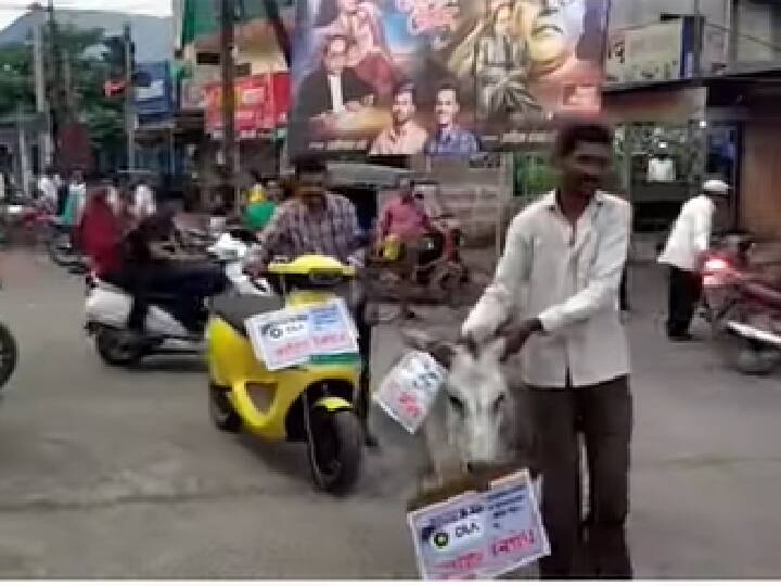 Maharashtra: Man Ties Ola E-Scooter To Donkey, Parades It Across Town. Here’s Why Maharashtra: Man Ties E-Scooter To Donkey, Parades It Across Town. Here’s Why