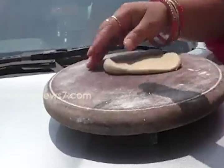Odisha: Woman Makes Roti On Bonnet Of Car In Sonepur Viral Video Heatwave Conditions In India Weather Update WATCH | Woman Makes Chapati On Bonnet Of Car In Sonepur As Odisha Reels Under Severe Heatwave