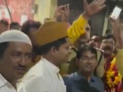 Rampur News: रामपुर में एकता की अनूठी मिसाल, बालाजी की शोभायात्रा पर मुस्लिम समुदाय के लोगों ने फूल बरसाकर किया स्वागत