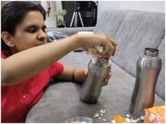 Watch: पानी की बोतल में पॉपकॉर्न भर फिल्म देखने थियेटर पहुंची मां- बेटी की जोड़ी, हैरान कर रहा जुगाड़