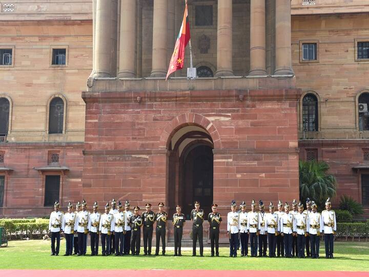 28 months in the role of Army chief, he also tackled security challenges posed by Taliban's takeover of Afghanistan, concerns on misuse of drones by terror groups and the issue of ceasefire violations at the India-Pakistan border. Here, MM Naravane in a group photograph after receiving guard of honour. (PTI Photo/Manvender Vashist)
