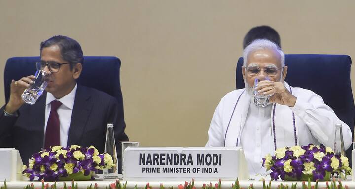 Prime Minister Narendra Modi with Chief Justice of India N. V. Ramana during a joint conference of CMs of States & Chief Justices of High Courts. (Image Source: PTI)