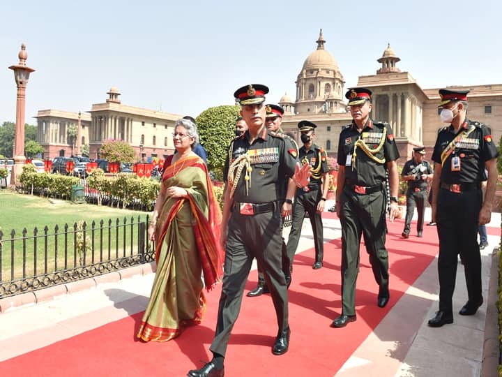 Army Chief General MM Naravane with his wife Veena Naravane after receiving guard of honour at the South Block lawns, prior to relinquishing his position as Chief of the Army Staff, in New Delhi, Saturday, April 30, 2022. (PTI Photo/Manvender Vashist)