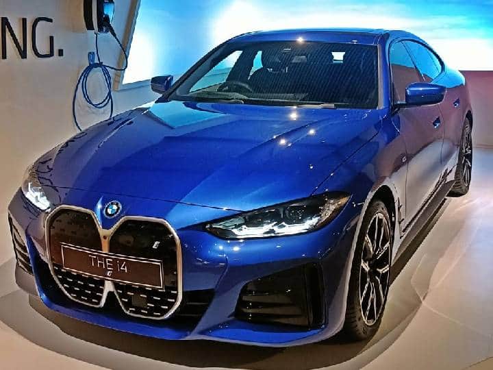 BMW i4 Electric Sedan Unveiled in India With Near 600km Range Launching on 26th May BMW i4: ఒక్కసారి చార్జ్ చేస్తే 600 కిలోమీటర్లు - సూపర్ రేంజ్ ఉన్న ఎలక్ట్రిక్ కారు వచ్చేస్తుందిగా!