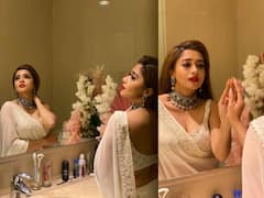 PHOTO: पांढऱ्या साडीत टिनाने आरशासमोर केलं फोटोशूट; फोटो चर्चेत!