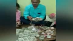 Satna News: EOW raids Scientist's house, currency worth Rs 30 lakhs recovered | ABP News