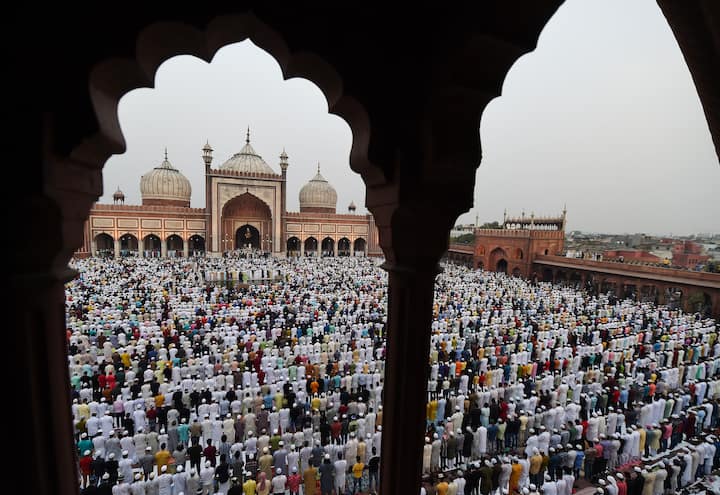People offer prayers at the historic Jama Masjid in old Delhi on Eid-ul-Fitr. (Image Source: PTI)