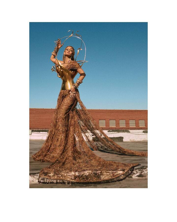 Natasha Poonawalla in a Sabyasachi gold handcrafted printed tulle sari and trail was an instant hit