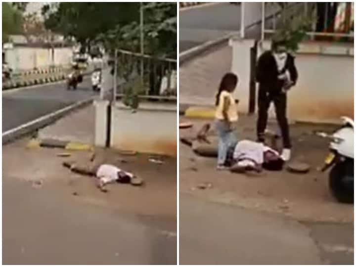 Woman came forward to help Policeman who fell unconscious due to heat Watch: गर्मी के कारण बेहोश होकर जमीन पर गिरा पुलिसकर्मी, मदद के लिए सामने आई महिला - वीडियो वायरल