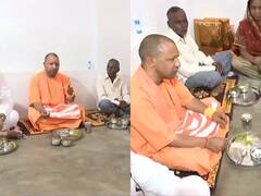 Yogi Adityanath In Ayodhya: पीएम आवास योजना के लाभार्थी मनीराम के घर पहुंचे CM Yogi, जमीन पर बैठकर किया भोजन, देखें तस्वीरें