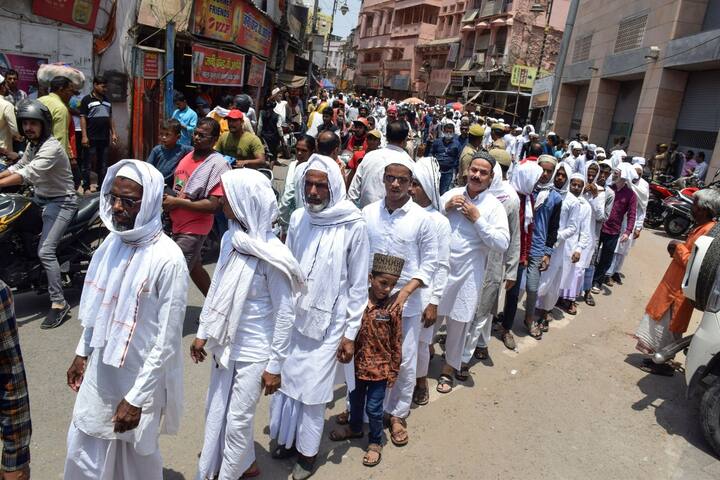 Muslim devotees form a queue to offer Friday namaz at the Gyanvapi Masjid before the survey of its premises in Varanasi on Friday. According to the reports, Hindu parties believe that earlier there used to be a temple on this site. It is being claimed that there is an idol of Bajrang Bali, as well as an idol of Ganesh ji inside. Apart from this, it is claimed that the real Shivling is hidden in the basement of the Gyanvapi Mosque. (Source: PTI)