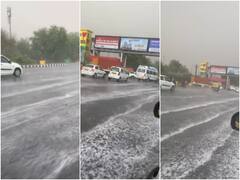 Delhi Rain: दिल्ली-एनसीआर में मौसम हुआ खुशगवार, नोएडा में बारिश के साथ पड़े ओले