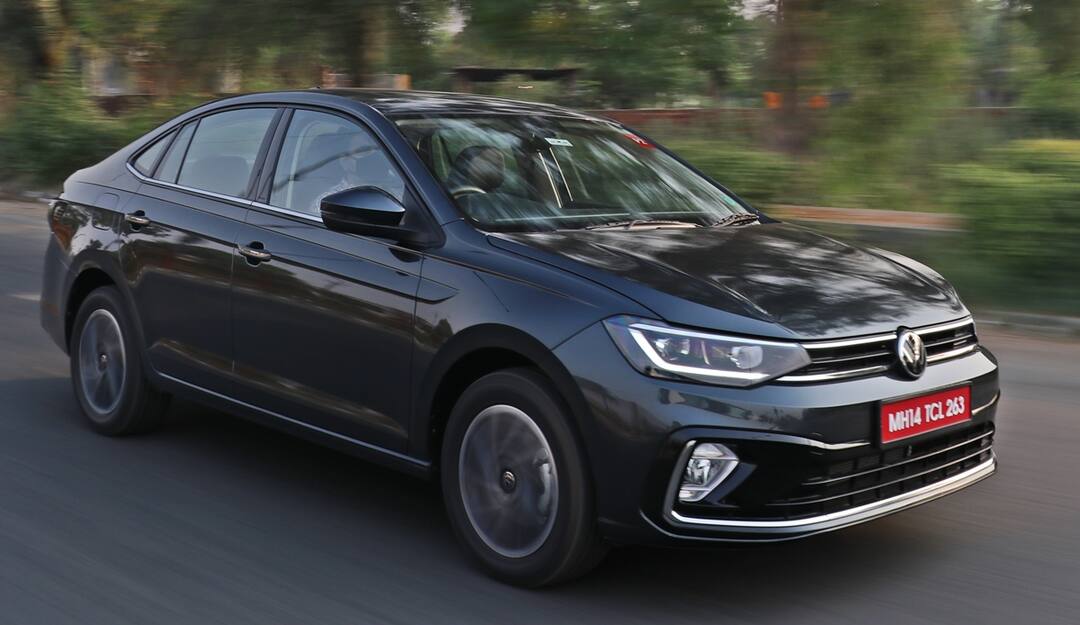 Volkswagen Virtus 1.0 TSI automatic review Volkswagen Virtus review: এসইউভির মতো গ্রাউন্ড ক্লিয়ারেন্স, দ্রুত ওভারটেকের ক্ষমতা ধরে এই সেডান