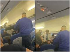 Watch: फ्लाइट में हुआ विवाद तो जमकर चले लात-घूंसे, पुलिस ने छह लोगों को किया गिरफ्तार