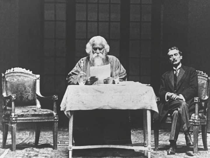Rabindranath Tagore giving a reading of his works in Rome, Italy, in the presence of Mussolini and government officials. He was the guest of the nation on his visit to the Italian capital.