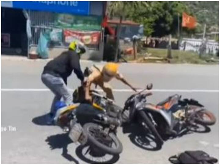 bike rider want to escape after seeing the police watch viral video Viral Video: पुलिसवाले से बचकर निकलना चाह रहा था बाइक सवार, तभी हुआ कुछ ऐसा, सोशल मीडिया यूजर्स ले रहे हैं मजे