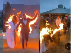 Viral Video: ఒంటికి నిప్పటించుకుని పరుగులు పెట్టిన వధూవరులు, ఇదేం పిచ్చిరా బాబు