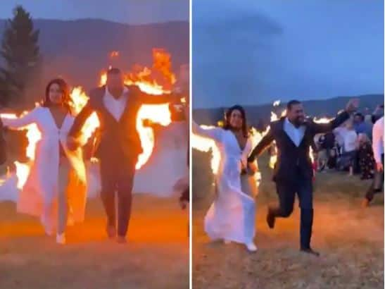 Watch: The bride and groom set themselves on fire, daredevil entry into their own wedding Watch : ਲਾੜੇ ਤੇ ਲਾੜੀ ਨੇ ਖੁਦ ਲਾਈ ਅੱਗ, ਆਪਣੇ ਹੀ ਵਿਆਹ 'ਚ ਡੇਅਰਡੇਵਿਲ ਐਂਟਰੀ